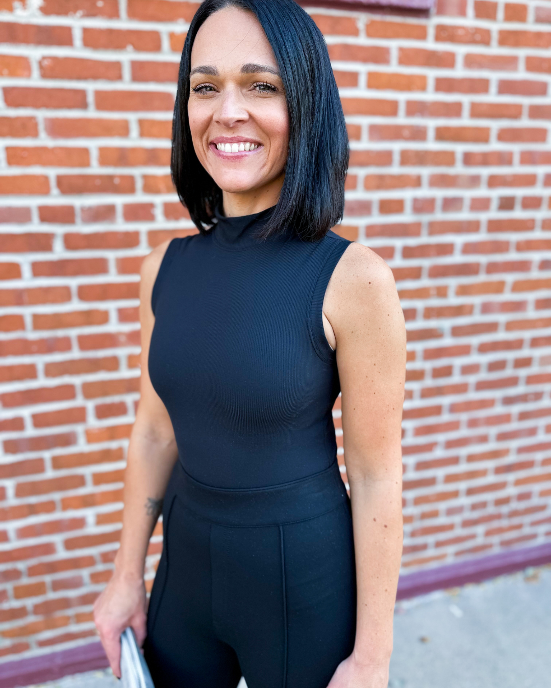 Suit Yourself Ribbed Mock Neck Sleeveless Bodysuit in Black - Spanx