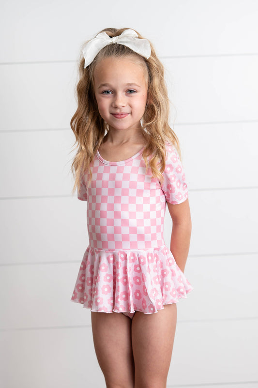 Kids Pinky Check Flower Skirted Leotard by Oopsie Daisy
