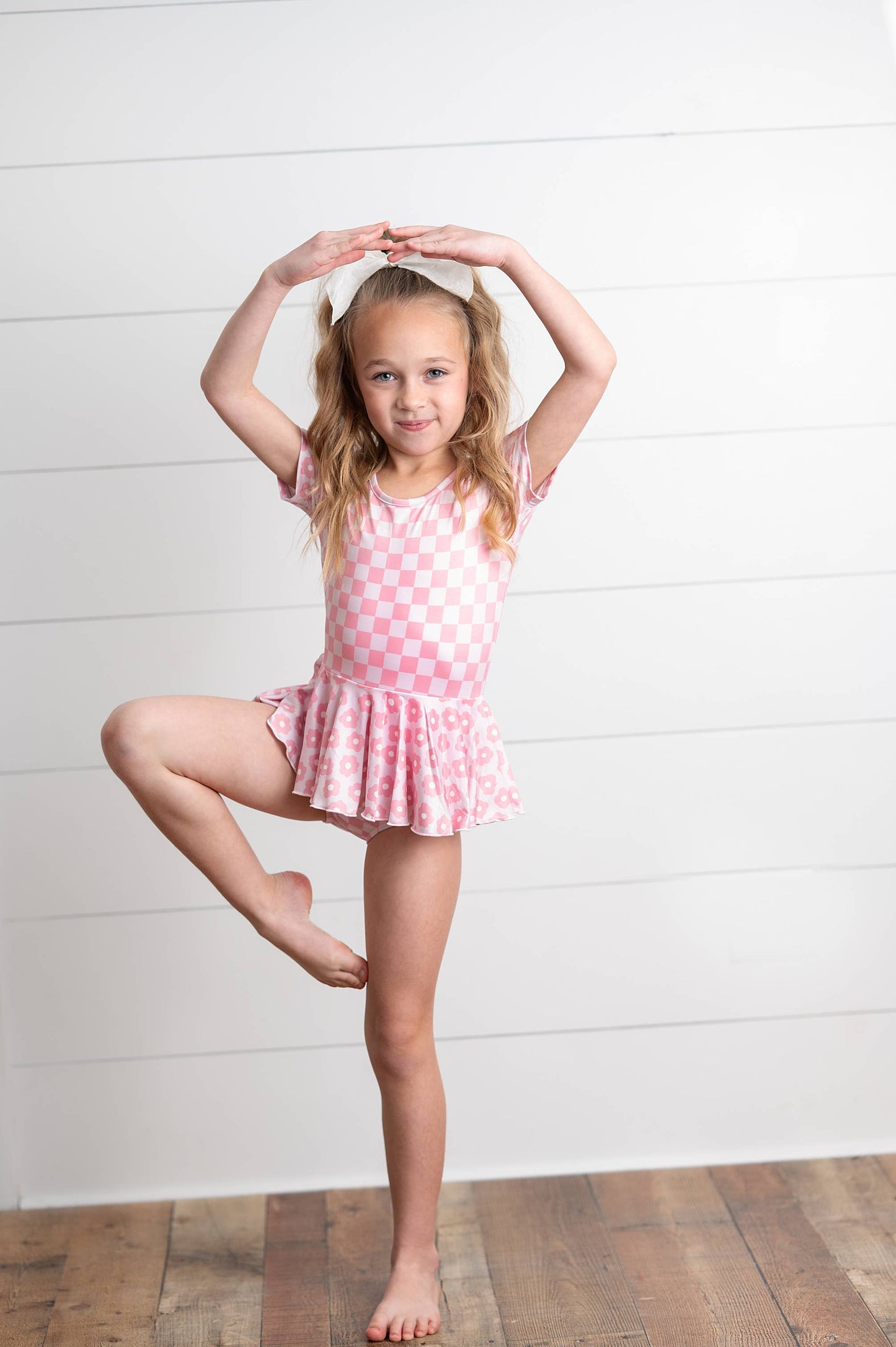 Kids Pinky Check Flower Skirted Leotard by Oopsie Daisy
